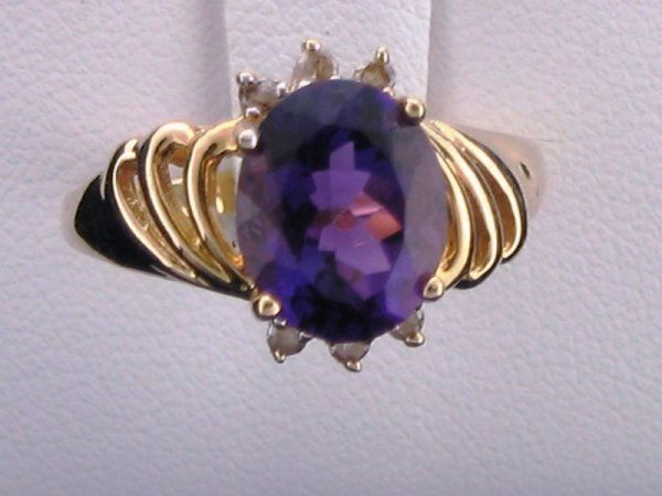 Amethyst & Diamond Ring Oval Cut: You are bidding on a Amethyst & Diamond Ring Oval Cut (GLA18) - This item's value has been appraised by Gemological Laboratory of American (GLA) for $1,064.00. The condition is NEW. The gemstones hav