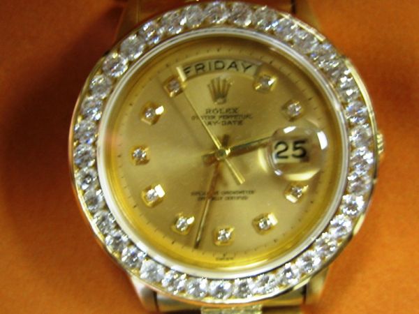 Men's Rolex Gold and Diamond Oyster Watch: You are bidding on a Men's Rolex Gold & Diamond Watch This is a Rolex Oyster Perpetual Day/Day Presidential Model with over 4.2 ctw of great diamonds. Retail replacement determined by GLA for over $48
