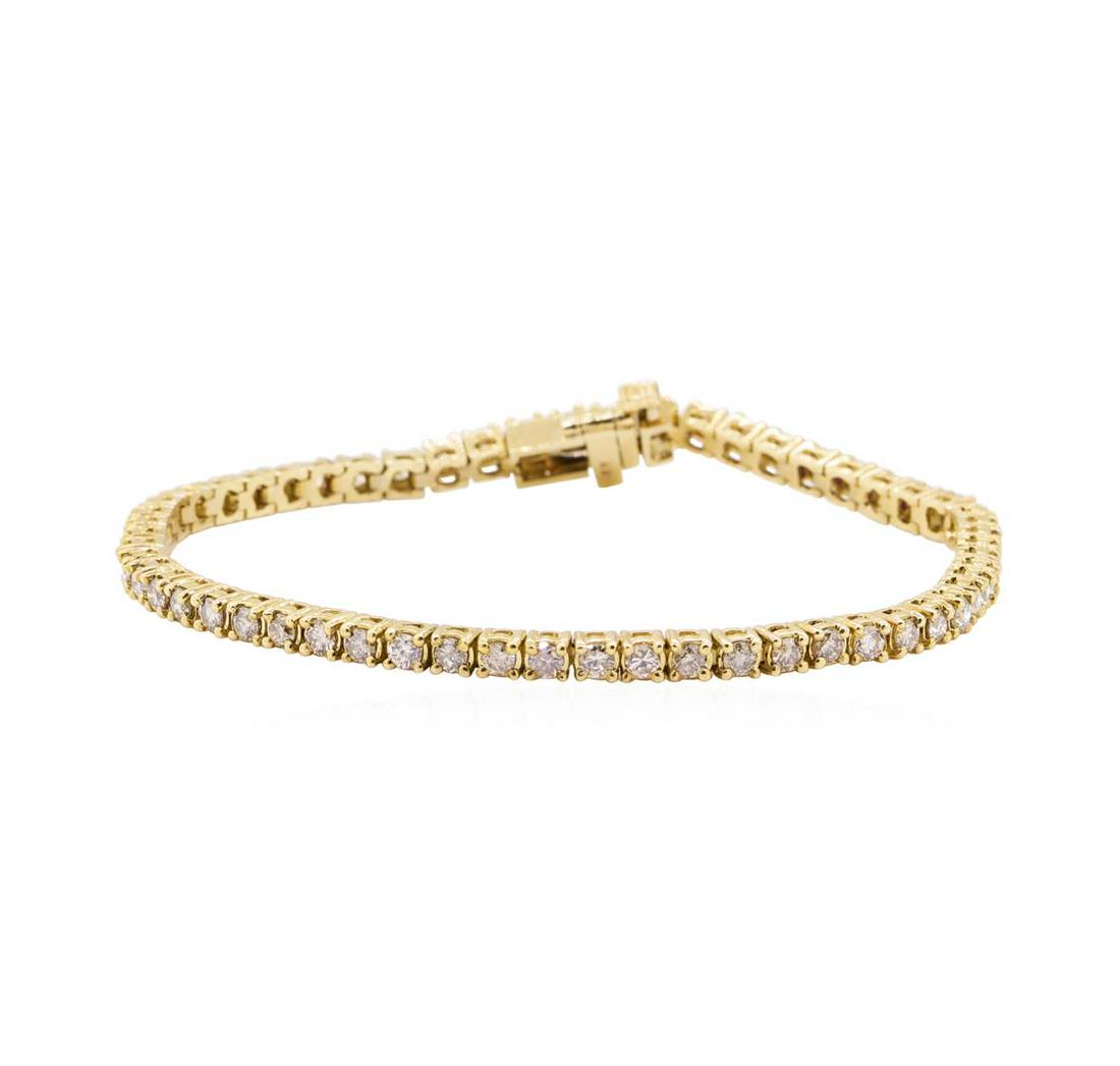 3.17 ctw Diamond Tennis Bracelet - 14KT Yellow Gold: One electronically tested 14KT yellow gold lady's combination cast & assembled fashion tennis bracelet with a tongue clasp with foldover safety with a bright polish finish. The featured lady's bracele