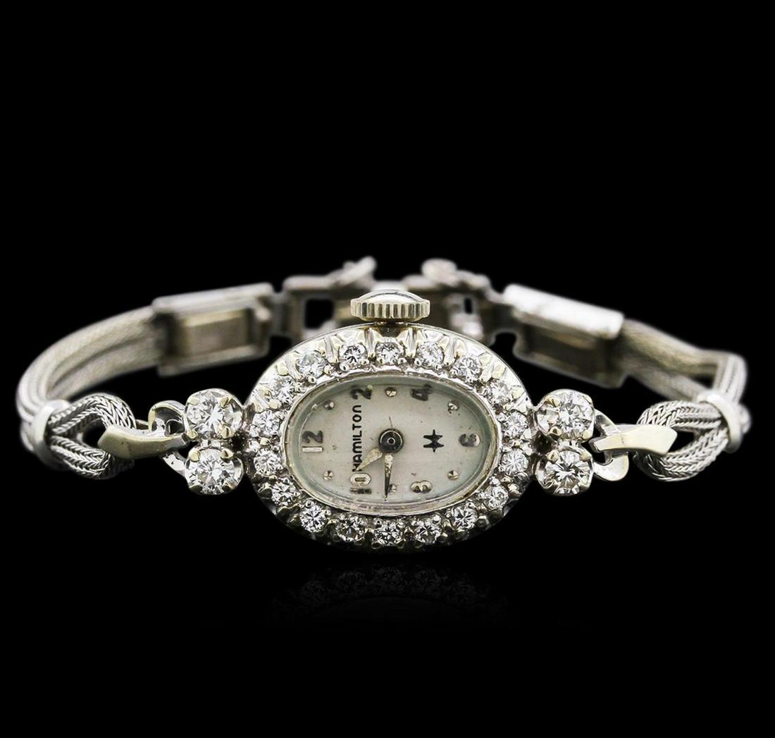 Hamilton 14KT White Gold Diamond Vintage Ladies Watch: One ladies, vintage Hamilton wristwatch electronically tested, 14KT white gold Case: 19 x 14mm, Case Back: space available for engraving, Fixed Case Lug terminals: high polish white gold, Case Lugs: s