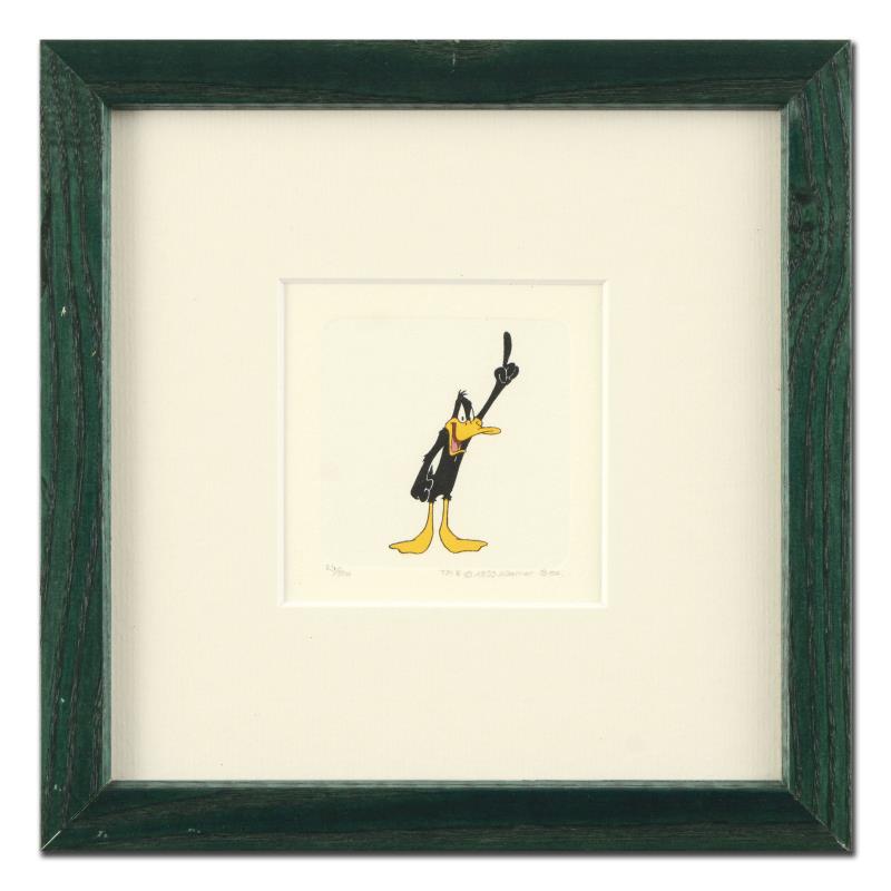 Daffy Duck (With Hand Up) by Looney Tunes: "Daffy Duck (With Hand Up)" is a limited edition etching on paper with hand-tinted coloring from Warner Bros, numbered and dated 1999. This piece comes framed. Measures approx. 8.5" x 8.5" (with frame