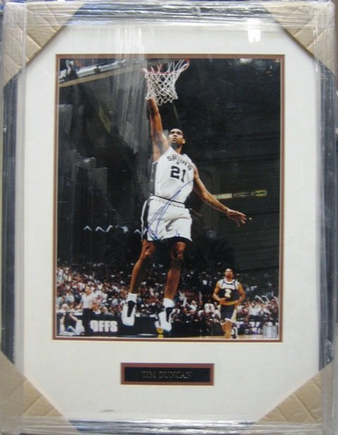 Tim Duncan Framed Signed 16x20 Photograph: You are bidding on a TIM DUNCAN SIGNED FRAMED 16x20 PHOTO Duncan is a 4X NBA Champion with the San Antonio Spurs and arguably the greatest power forward in the history of the NBA. Thi