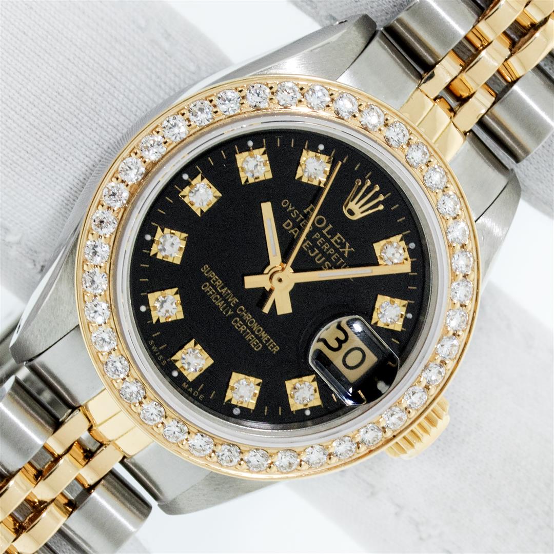 Rolex Ladies 2 Tone Black Diamond Bezel & 1 ctw 18K: One Ladies Two Tone Rolex Datejust Polished, Serviced & Electronically Tested, Yellow Gold & Stainless Steel Case: 26mm, Yellow Gold Crown, Custom Bezel: New 18K 1ctw Yellow Gold Beadset Diamond Bezel