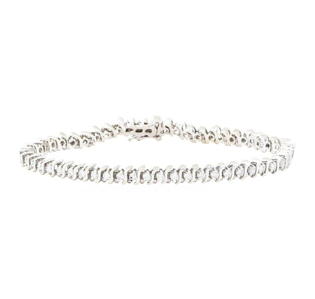 2.05 ctw Diamond S Style Tennis Bracelet" - 14KT White: One electronically tested 14KT white gold lady's combination cast & assembled fashion straight line 'S' style tennis bracelet with a tongue clasp with foldover safety with a bright polish finish. The 