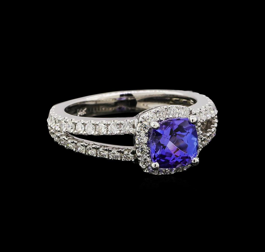 14KT White Gold 1.34 ctw Tanzanite and Diamond Ring: One electronically tested 14KT white gold ladies combination cast & assembled tanzanite and diamond ring with a bright polish finish. Identified with markings of "14K". Condition is new. Containing: O