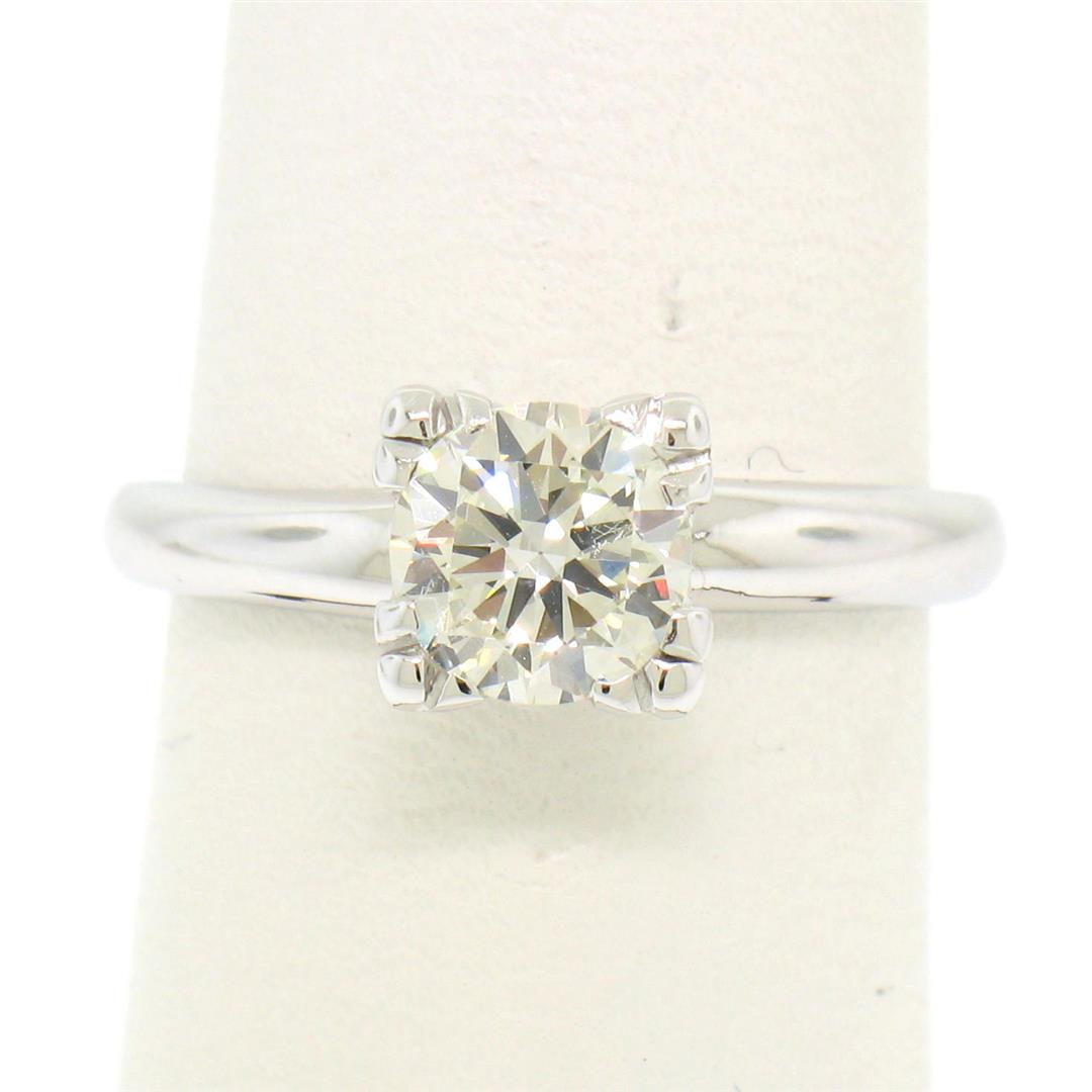 14k White Gold 0.83 ctw I VVS2 Round Brilliant Cut: One Vintage 14k White Gold 0.83ct I VVS2 Round Brilliant Cut Diamond Solitaire Ring. Item Details: Material: 14k Solid White Gold, Weight: 2.9 Grams, Stone(s): (1) Natural Genuine Diamond - Round Bril