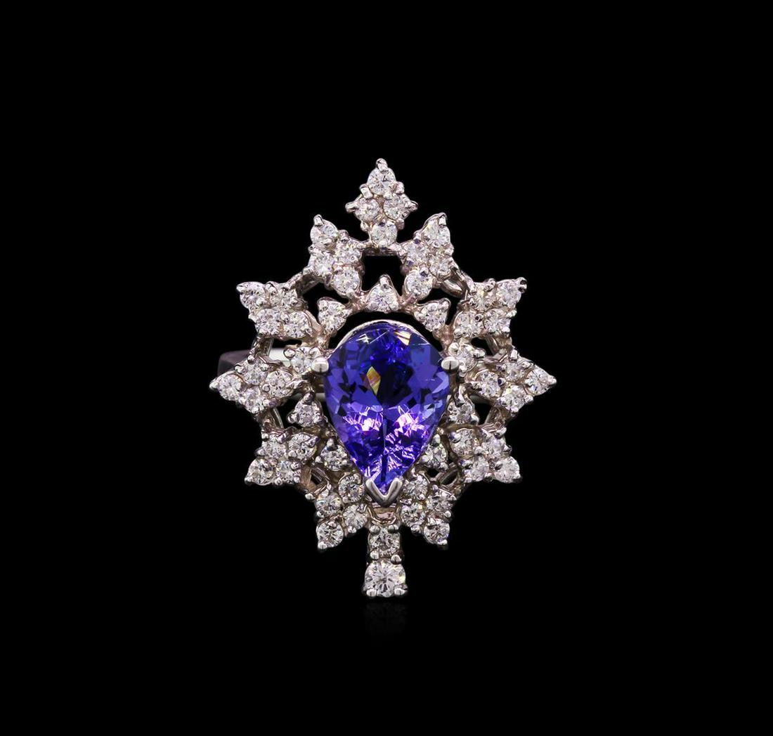 2.00 ctw Tanzanite and Diamond Ring - 14KT White Gold: One electronically tested 14KT white gold lady's cast cocktail ring with a tapered shank with a bright polish finish. The featured lady's ring has a shank measuring 3.35 millimeters wide. Identified w