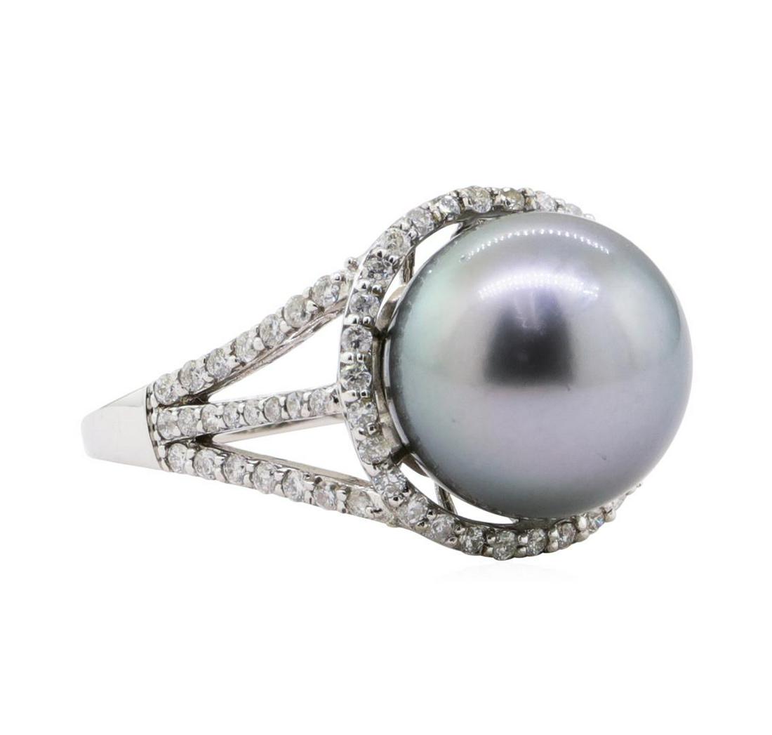 0.53 ctw Pearl and Diamond Ring - 14KT White Gold: One electronically tested 14KT white gold ladies cast & assembled Tahitian cultured pearl & diamond ring. The ring features a Tahitian cultured pearl set within a diamond bezel, supported by diamond s