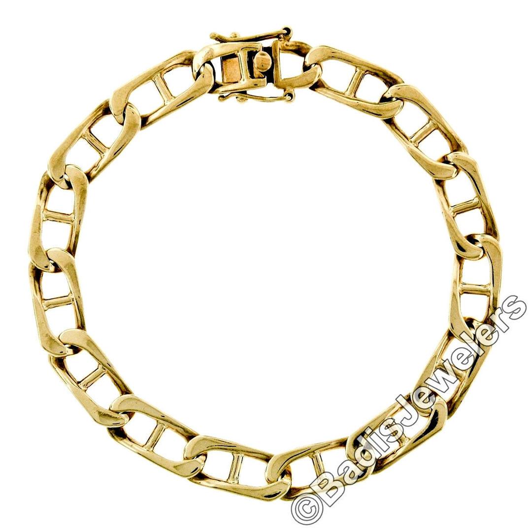Vintage 14kt Yellow Gold 8.4mm Large Gucci Link Chain: A vintage men's 14kt yellow gold chain bracelet with large 8.4mm gucci links. It weighs a total of 32.94 grams, measures 8.4mm wide, and measures 8.75 inches in length.