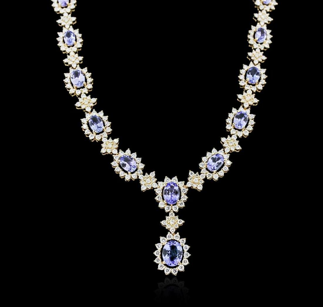 14KT Yellow Gold 10.54 ctw Tanzanite and Diamond: One electronically tested 14KT yellow gold ladies cast tanzanite and diamond necklace with a hidden box clasp with safety closer with a bright polish finish. Measurements: 16.50" in length Identified 