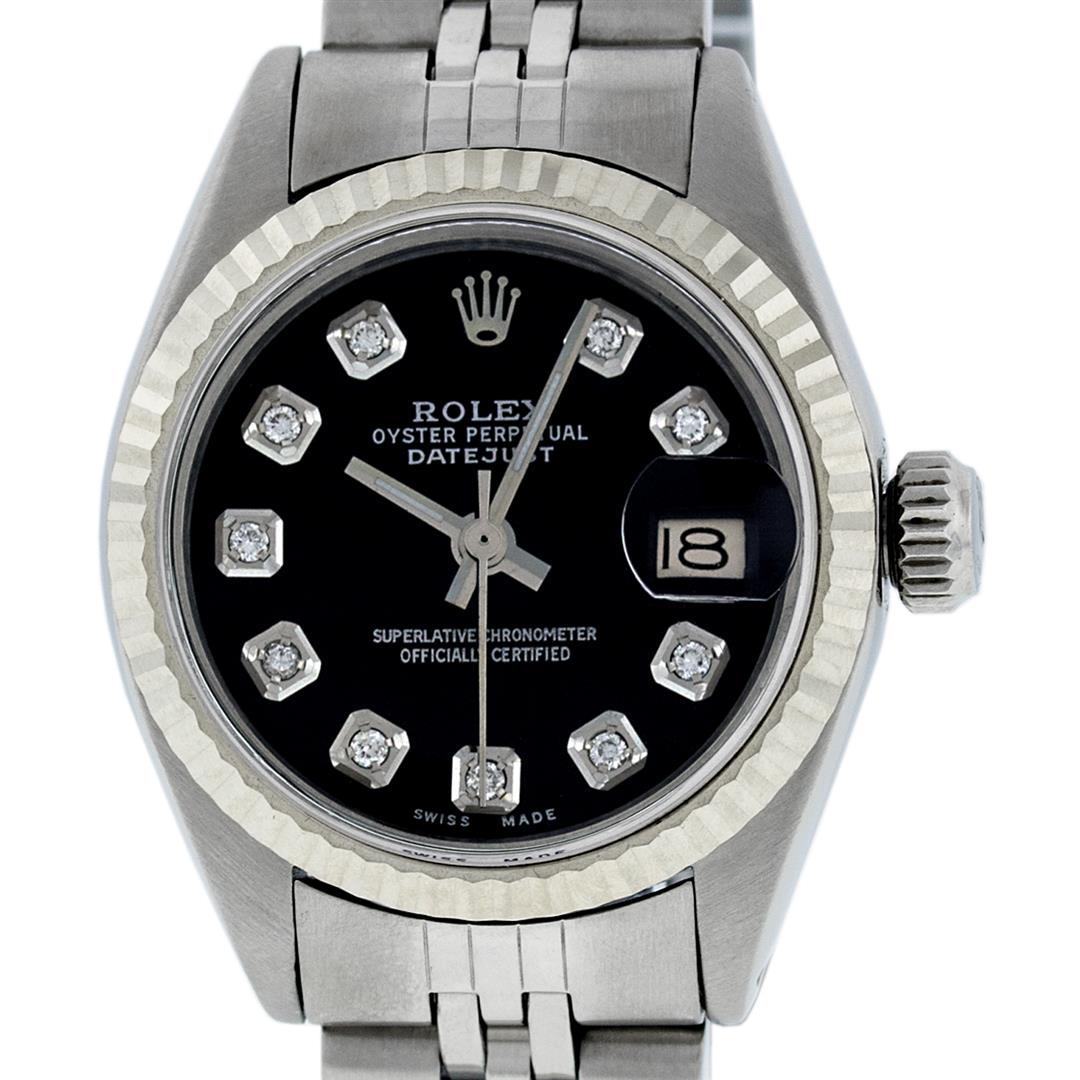 Rolex Ladies Stainless Steel Black Diamond 26MM Oyster: One Ladies Stainless Steel Rolex Datejust Polished Bright with Satin Finish, Serviced & Electronically Tested, Stainless Steel Case: 26mm, Stainless Steel Crown, Bezel: 14K White Gold Fluted Bezel. Cu