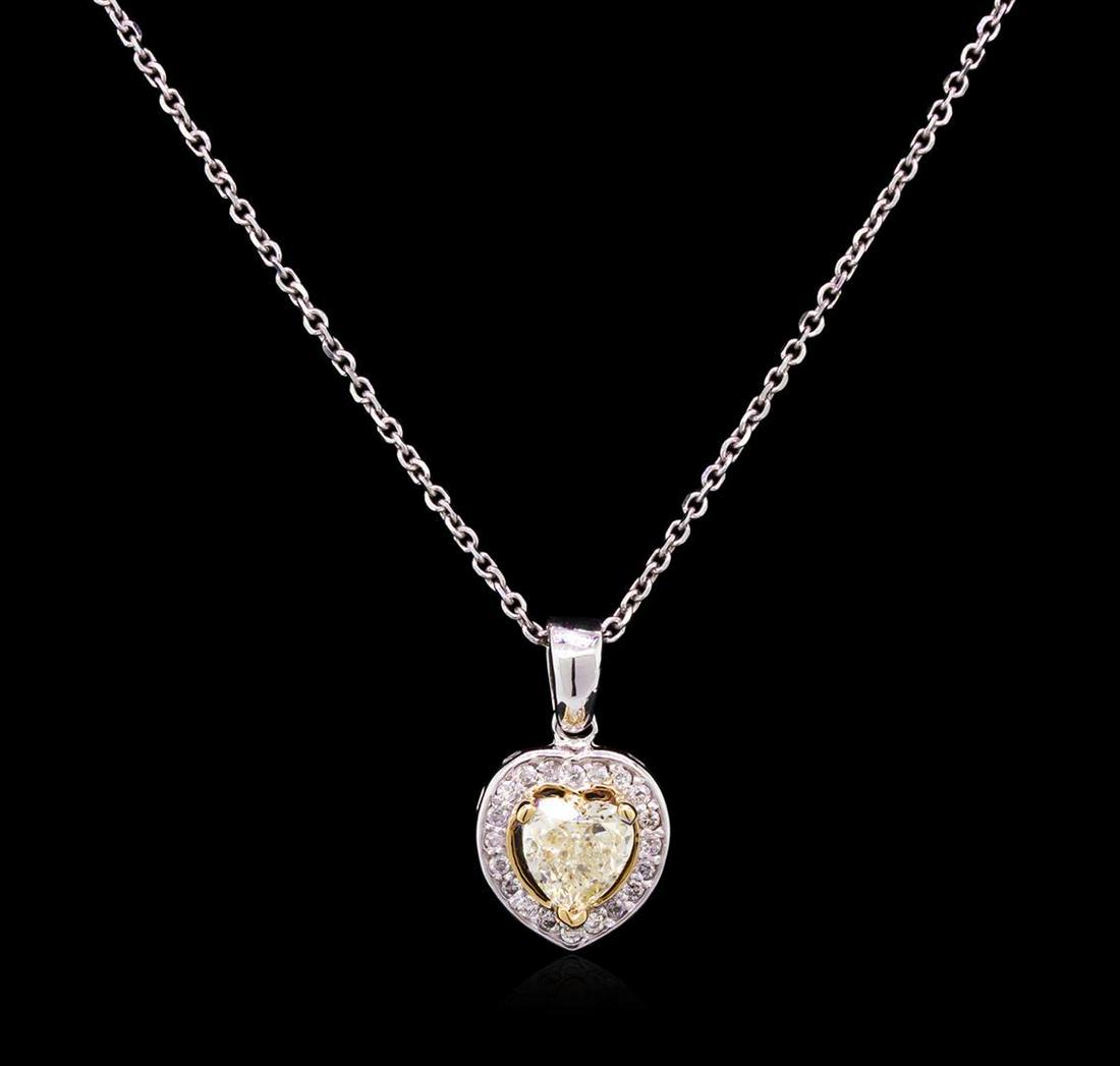1.15 ctw Yellow Diamond Pendant With Chain - 14KT White: One electronically tested 14KT white gold ladies cast & assembled diamond pendant and chain. The pendant features a heart shaped diamond set within a diamond bezel, completed by a white gold bail. The