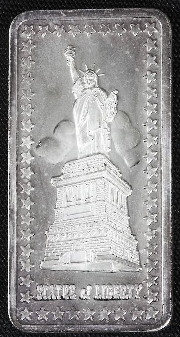 One Troy Oz. Pure Silver - Statue of Liberty #12: One Troy Oz. Pure Silver - Statue of Liberty #12 As-Is Condition. A18199. Has some stains and discoloration, but still decent condition and can read story on reverse. Thank you for viewing this auctio