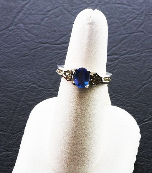 Ladies Diamond & Tanzanite Ring.58cts FJ66: Ladies Diamond & Tanzanite Ring.58cts FJ66 As-Is Condition FJ 99833KL Thank you for viewing this auction. We appreciate your business. Thank you from Seized Assets Auctioneers.