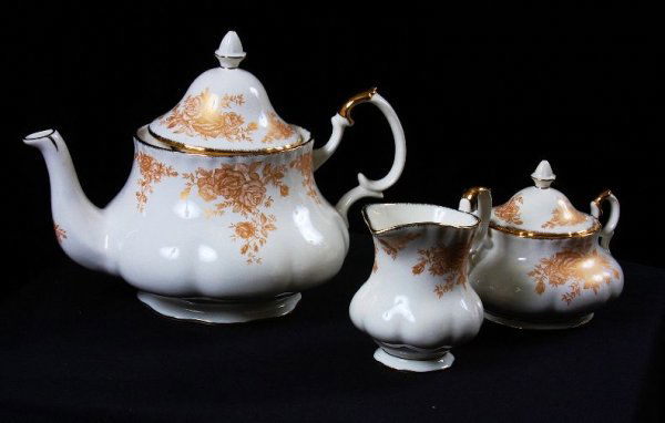 Royal Albert Roses Gold 3-pc. China Tea Set: Royal Albert Roses Gold 3-pc. China Tea Set - 1A130A. Brand New & Unused Condition in original box with original packaging. Thank you for viewing this auction. We appreciate your business. Check out o