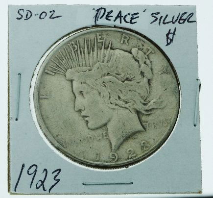 1923 Peace Silver Dollar SD02: 1923 Peace Silver Dollar SD02 - As-Is Condition - Thank you for viewing this auction. We appreciate your business. Check out our future auctions from Seized Assets Auctioneers.
