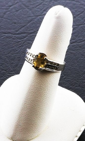 Ladies Diamond & Citrine Ring .95cts FJ16: Ladies Diamond & Citrine Ring .95cts FJ16 - As-Is Condition FJ 99901KL - Thank you for viewing this auction. We appreciate your business. Check out our future auctions from Seized Assets Auctioneers.