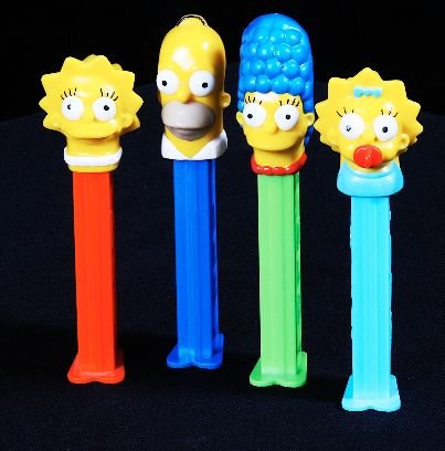 Lot of (4) Vintage Pez Dispensers - The Simpsons: Lot of (4) Vintage Pez Dispensers - The Simpsons - Excellent Used Condtion. Good paint, no cracks, working condition. - Thank you for bidding on this item and taking place in this auction. We apprecia