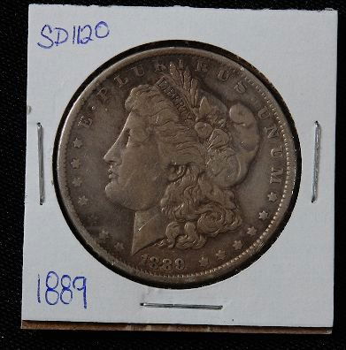 1889 Morgan Silver Dollar SD1120: 1889 Morgan Silver Dollar SD1120 - AE817D - Thank you for bidding on this item. We appreciate your business. Be sure to check out all of the upcoming auctions offered by Seized Assets Auctioneers!