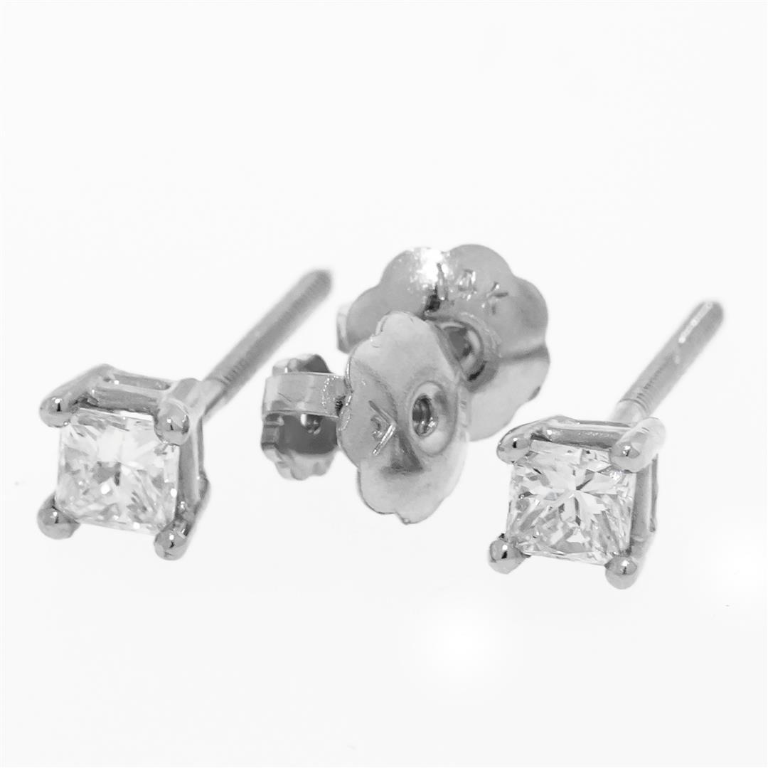 New 14K White Gold Princess Cut Solitaire Stud Earrings: One Pair Of New 14K White Gold Ladies Diamond Stud Princess Cut Solitaire Earrings, Diamond Cut: Brilliant Princess Cut, Diamond Weight: .20 Carat; Stone Count: 2 Stones .10 Carat Each, Diamond Color: