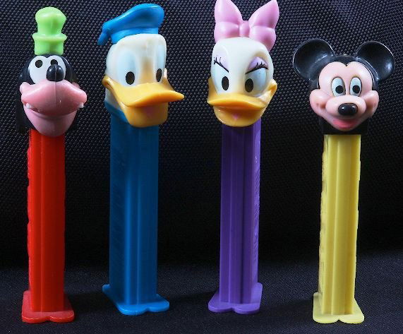 Mickey Mouse #7 - Lot of (4) Vintage Pez Dispenser: Mickey Mouse #7 - Lot of (4) Vintage Pez Dispensers - Excellent Used Condtion. Good paint, no cracks, working condition. - Thank you for bidding on this lot. We appreciate your business. Be sure to ch