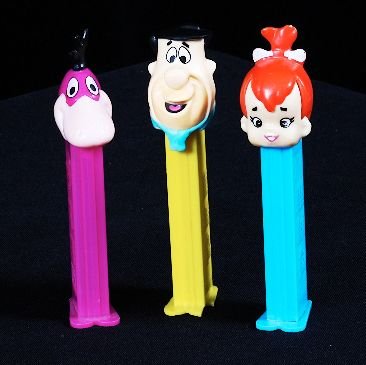 Lot of (3) Vintage Pez Dispensers - The Flintstone: Lot of (3) Vintage Pez Dispensers - The Flintstones - Excellent Used Condtion. Good paint, no cracks, working condition. - Thank you for bidding on this item and taking place in this auction. We appre