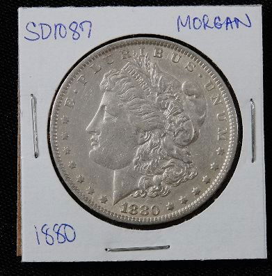 1880 Morgan Silver Dollar SD1087: 1880 Morgan Silver Dollar SD1087 - AE817D - Thank you for bidding on this item. We appreciate your business. Be sure to check out all of the upcoming auctions offered by Seized Assets Auctioneers!