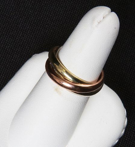 Cartier Trinity 18K Tri-Color Rolling Ring #1: Cartier Trinity 18K Tri-Color Rolling Ring #1 Size 6.5 & 6mm width - Amazing Tri-Ring. #DK0529W. Worth a good look. Has Rose, Yellow and White Gold Bands. This one measures approximately a Size 6 1/2
