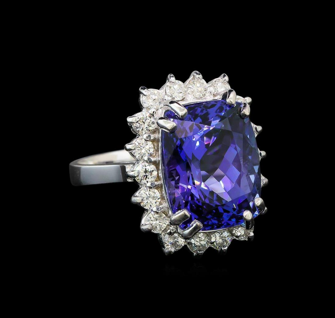 14KT White Gold 8.25 ctw Tanzanite and Diamond Ring: One electronically tested 14KT white gold ladies cast tanzanite and diamond ring with a bright polish finish. Identified with markings of "K14". Condition is new. Containing: One prong set oval modifi