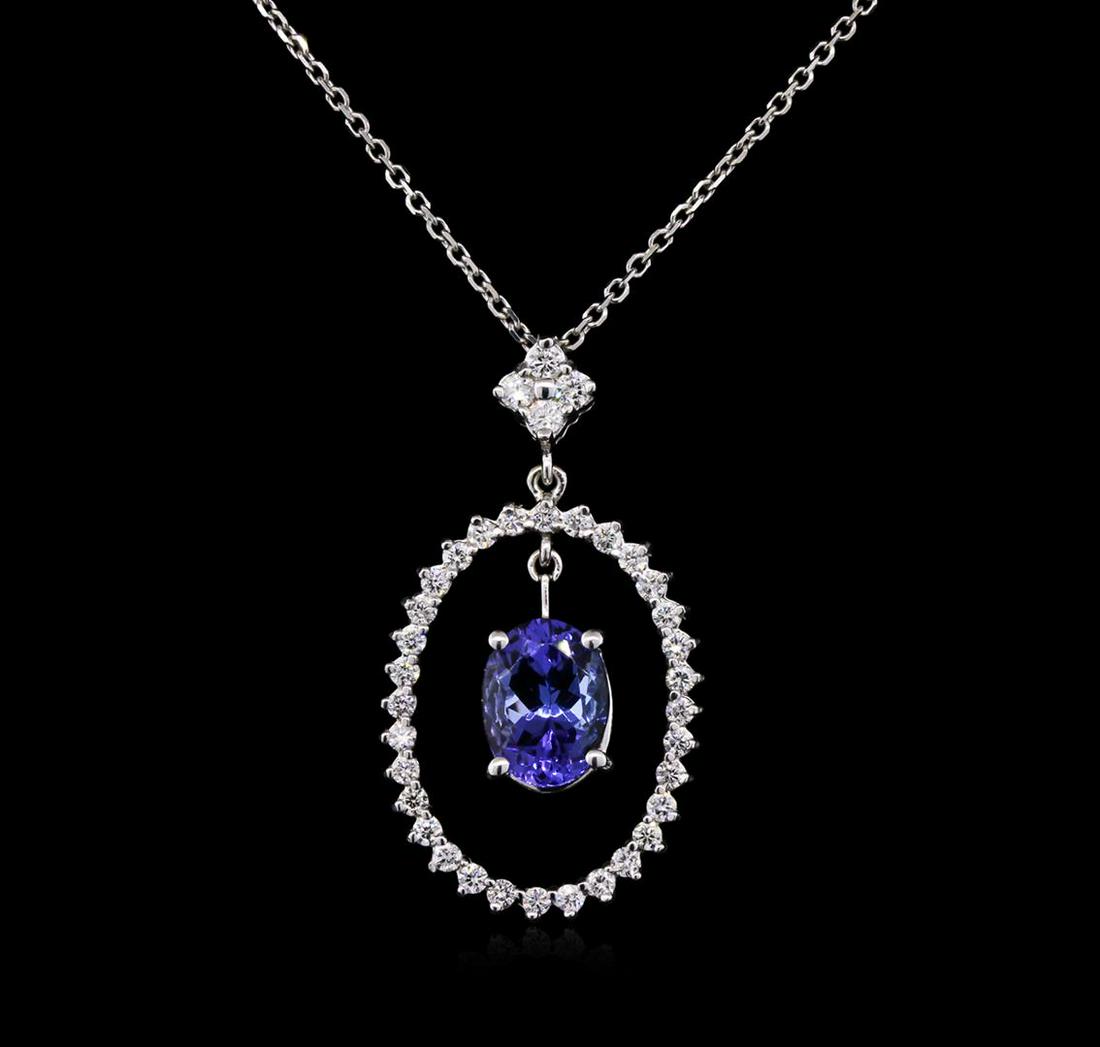 2.00 ctw Tanzanite and Diamond Pendant With Chain -: One pendant featuring: 14KT white gold weighing 2.41 grams containing one tanzanite with a total weight of 2.00 ct and diamonds with a total weight of 0.58ct.