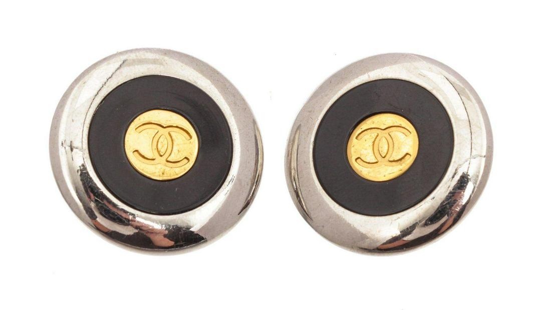 Chanel Black Earrings: Chanel Black Earrings with silver-tone hardware. Measurements: Length: 1.25 in / 3 cm Width: 1.25 in / 3 cm 0.25 in / 1 cmCONDITION: Pre-Owned Good overall, please see photographs for detail.