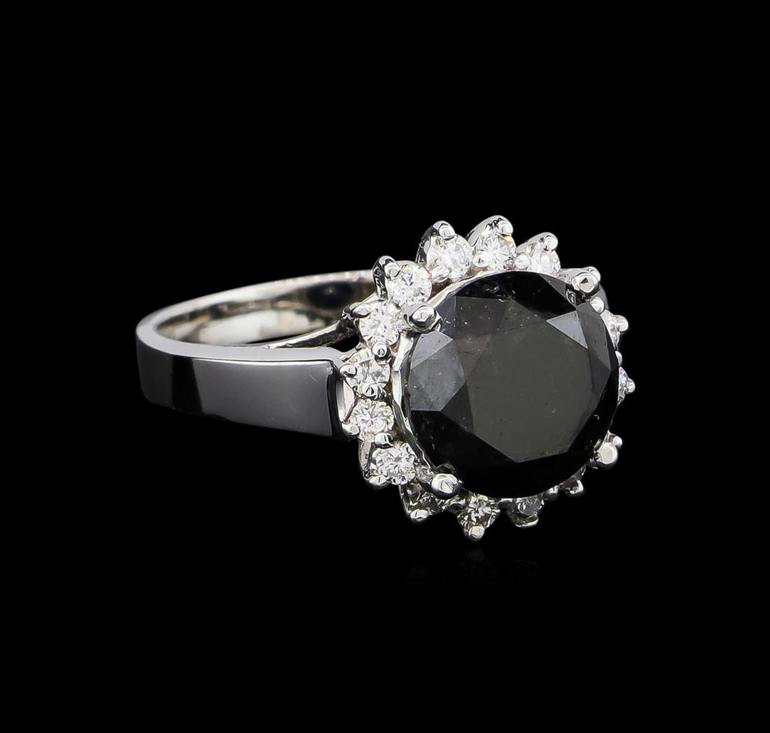 4.95 ctw Black Diamond Ring - 14KT White Gold: One ring featuring: 14KT white gold weighing 4.90 grams containing one black diamond with a total weight of 4.55ct and side diamonds with a total weight of 0.40 ct.
