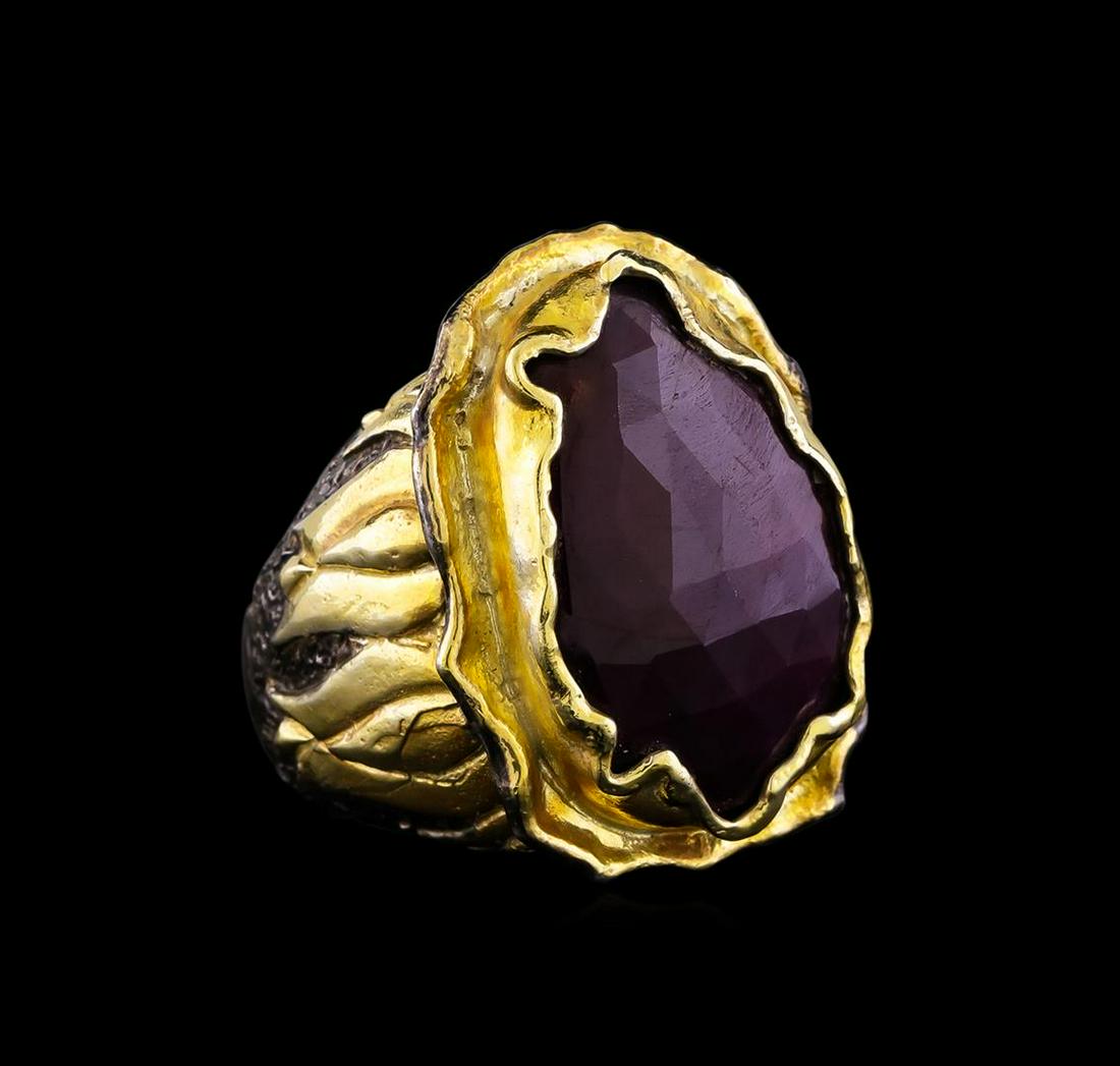 Sterling Silver Ring: One of a kind high fashion sterling silver Ring weighing 29.1 grams. Black Antique texture. Containing: Ruby. This sterling silver promises a lasting shine.