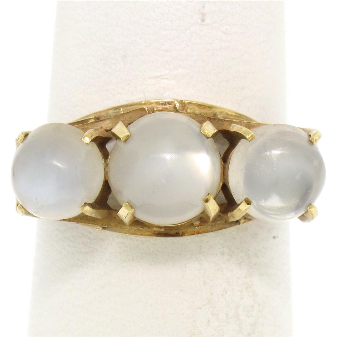 Antique 18k Gold 4.50 ctw Three Stone Cabochon: One Antique 18k Rose Gold 4.50 ctw Three Stone Cabochon Moonstone Open Work Band Ring. Item Details: Material: 18k Solid Rose Gold, Weight: 4.5 Grams, Stone(s): (3) Natural Genuine Moonstone - Round C