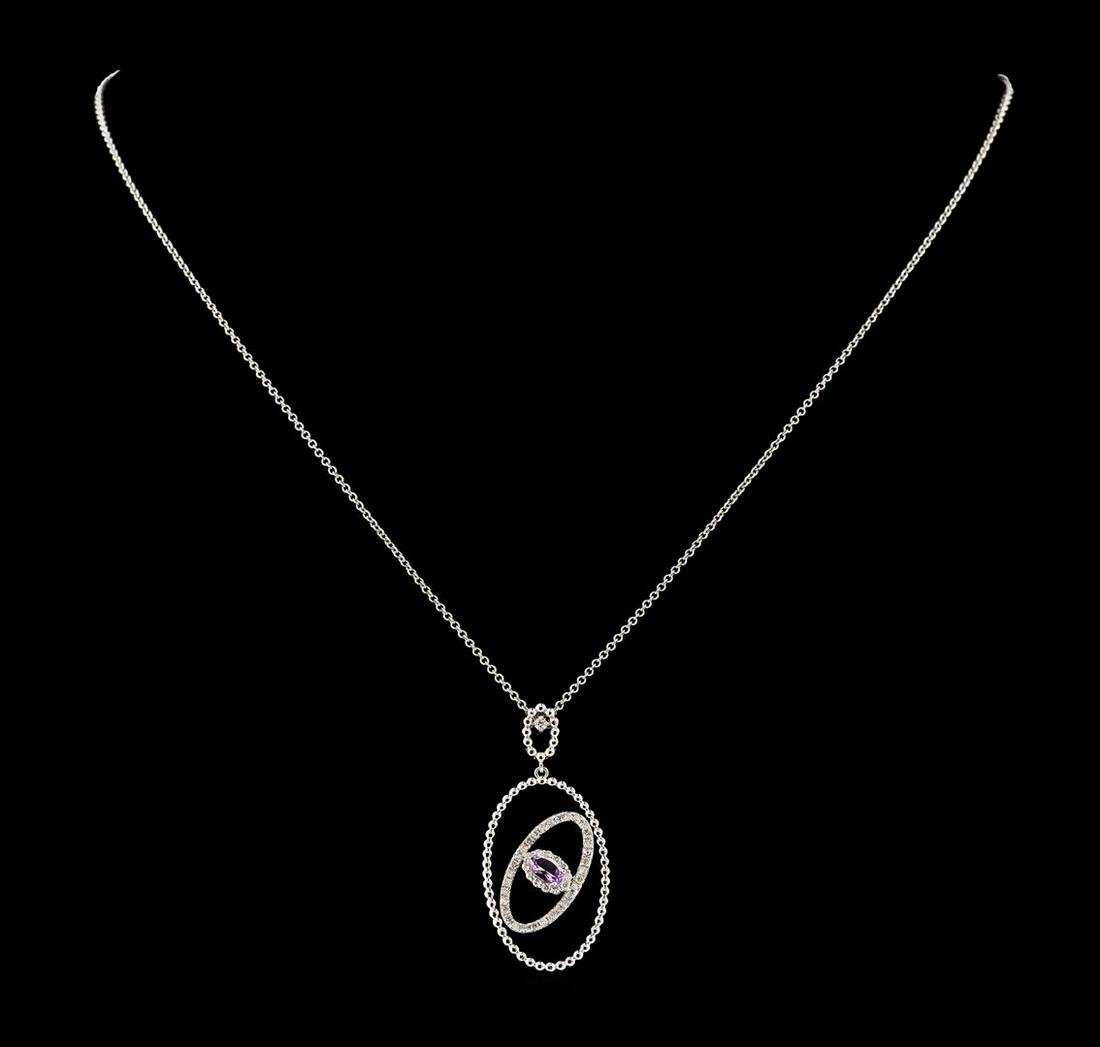 0.25 ctw Morganite and Diamond Pendant With Chain -: One Morganite and Diamond Pendant With Chain featuring: 14KT White Gold with a total weight of 2.95 grams, morganite with a total weight of 0.25ct, and 45 Diamonds with a total weight of 0.30 ctw.