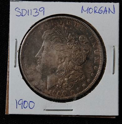 1900 Morgan Silver Dollar SD1139: 1900 Morgan Silver Dollar SD1139 - AE817D - Thank you for bidding on this item. We appreciate your business. Be sure to check out all of the upcoming auctions offered by Seized Assets Auctioneers!