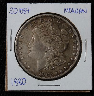 1880 Morgan Silver Dollar SD1084: 1880 Morgan Silver Dollar SD1084 - AE817D - Thank you for bidding on this item. We appreciate your business. Be sure to check out all of the upcoming auctions offered by Seized Assets Auctioneers!