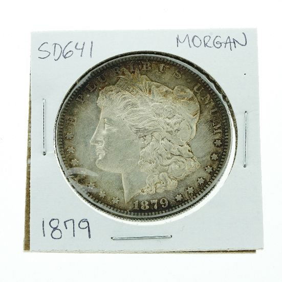 1879 Morgan Silver Dollar SD641: 1879 Morgan Silver Dollar SD641 - Good - As-Is Condition. Coin #A57195 - Thank you for viewing this auction. We appreciate your business. Check out our future auctions from Seized Assets Auctioneers.