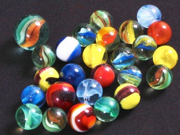 Vintage Glass Marbles (25) w/ Large Shooter Lot #5: Vintage Glass Marbles (25) w/ Large Shooter Lot #5 - As-Is Condition Vintage Condtion of machine-made glass marbles. Assorted colors and sizes. Thank you for viewing this auction. We appreciate your b