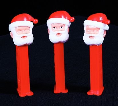 Lot of (3) Vintage Pez Dispensers - Santa Claus: Lot of (3) Vintage Pez Dispensers - Santa Claus - Excellent Used Condtion. Good paint, no cracks, working condition. - Thank you for bidding on this item and taking place in this auction. We appreciat
