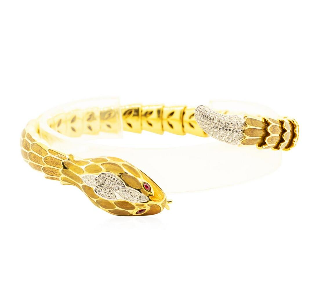 18KT Yellow Gold David Webb Snake Flexable Bangle: One electronically tested 18KT yellow and white gold lady's David Webb combination cast & assembled fashion designer flexable bangle braclet with a enameled snake motif with a bright polish finish. Co