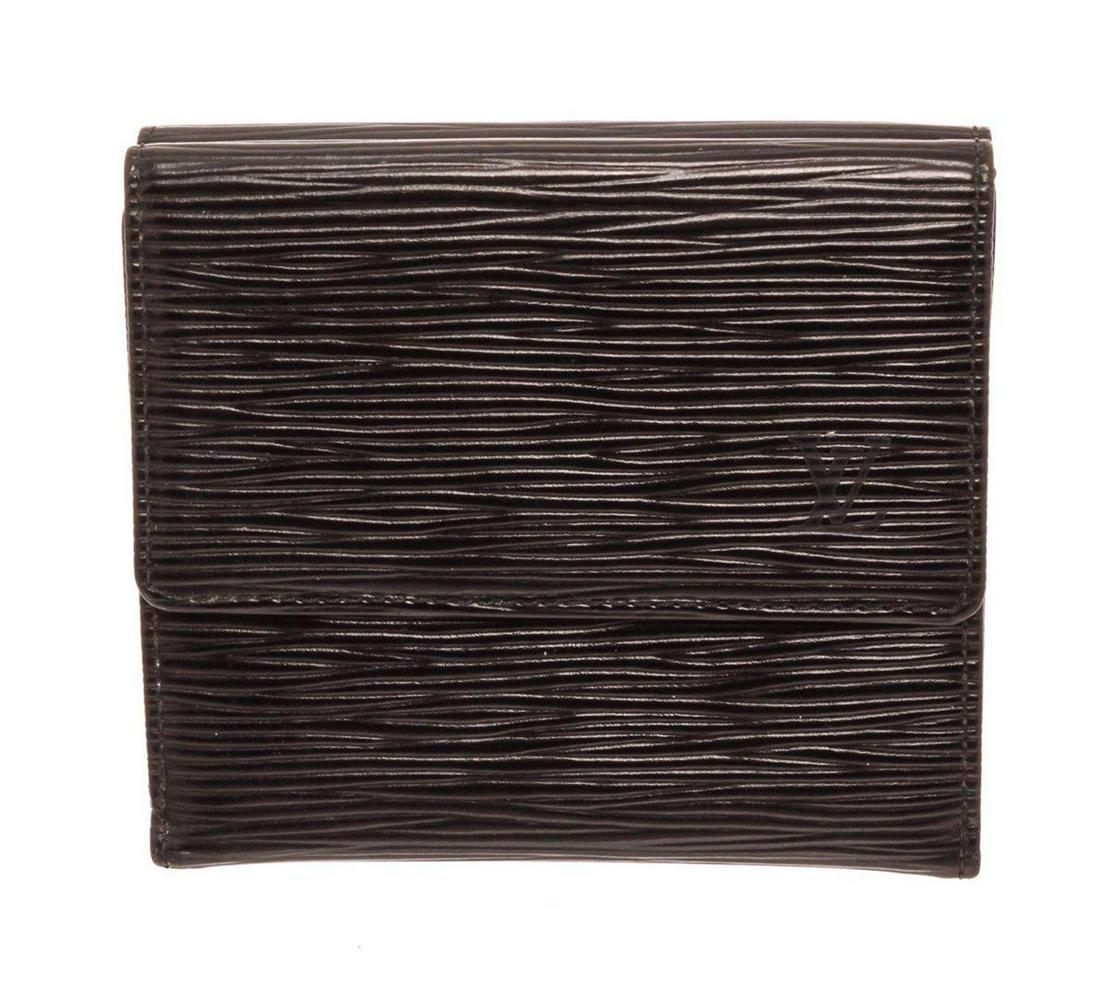 Louis Vuitton Black Epi Leather Elise Wallet: Louis Vuitton Black Epi Leather Elise Wallet. Louis Vuitton Black Epi Leather Elise Wallet with silver-tone hardware, dual exterior pockets, Debossed logo, leather lining & dual interior pockets, snap