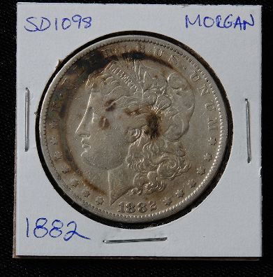 1882 Morgan Silver Dollar SD1098: 1882 Morgan Silver Dollar SD1098 - AE817D - Thank you for bidding on this item. We appreciate your business. Be sure to check out all of the upcoming auctions offered by Seized Assets Auctioneers!