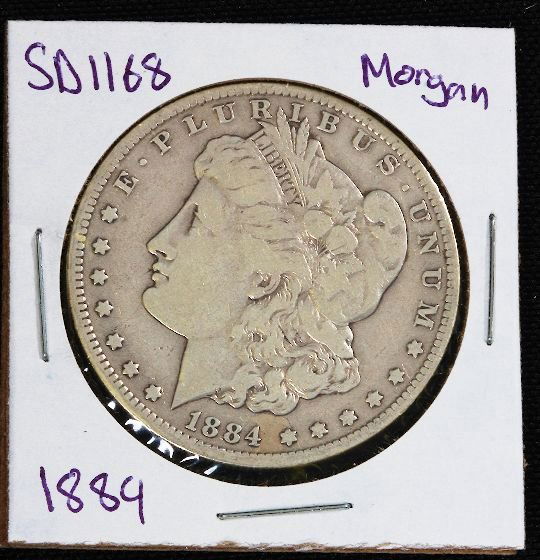 1884 Morgan Silver Dollar SD1168: 1884 Morgan Silver Dollar SD1168 - Good Circulated Condition. AS712C - Thank you for viewing this lot. Be sure to check out all of our future auctions. We appreciate your business. Thanks again from S