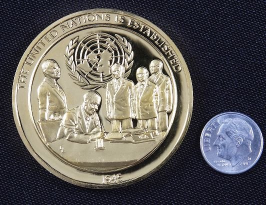 "The United Nations" #94 24Kt Gold Plated Sterling: The United Nations" #94 24Kt Gold Plated Sterling Silver Medal - This is a rare Franklin Mint "History of Mankind" 24kt. Gold Plated over Sterling Silver Medal. Coin weights 1.985 Troy Oz. (Nearly 2 f