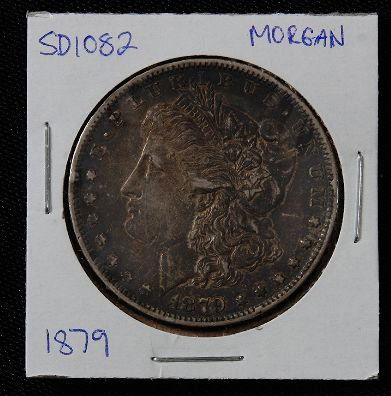 1879 Morgan Silver Dollar SD1082: 1879 Morgan Silver Dollar SD1082 - AE817D - Thank you for bidding on this item. We appreciate your business. Be sure to check out all of the upcoming auctions offered by Seized Assets Auctioneers!