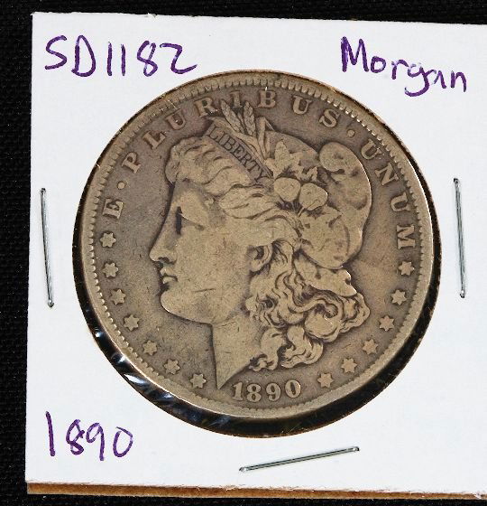 1890 Morgan Silver Dollar SD1182: 1890 Morgan Silver Dollar SD1182 - Good Circulated Condition. AS712C - Thank you for viewing this lot. Be sure to check out all of our future auctions. We appreciate your business. Thanks again from S