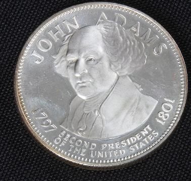 John Adams 33.1gm. Sterling Silver Presidents #5: John Adams 33.1gm. Sterling Silver Presidents #5 - Franklin Mint American Presidents medal. Short biography reverse. Marked Sterling" reverse. Slightly larger than a silver dollar, little more than on