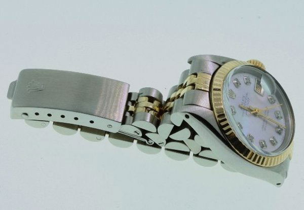 Ladies Rolex Two-Tone Just Date Wristwatch A87 Ful: Ladies Rolex Two-Tone Just Date Wristwatch A87 Full Letter - Excellent Condition - Full Letter of Authentication from AIG - 18KT Yellow Gold 52.30 gm. - Thank you for viewing this auction. We apprecia