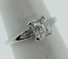 Antique Tiffany and Co. 1.20ct Square Diamond Soli: Antique Tiffany and Co. 1.20ct Square Diamond Solitaire Ring - Awesome Ring. Comes with full appraisal letter of a $15,865.00 value. Dated 1921. G-H Color VS-I1 clarity. Size 4.5 weighs 2.5 grams. - T
